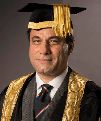 The University of Birmingham's seventh Chancellor, Lord Karan Bilimoria, wearing his gold-trimmed gown and mortarboard