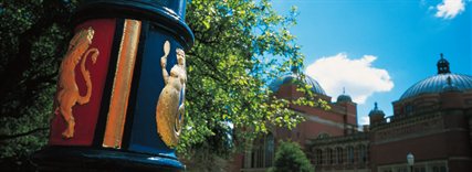 A detail photograph of a University lamp post featuring the mermaid and lion