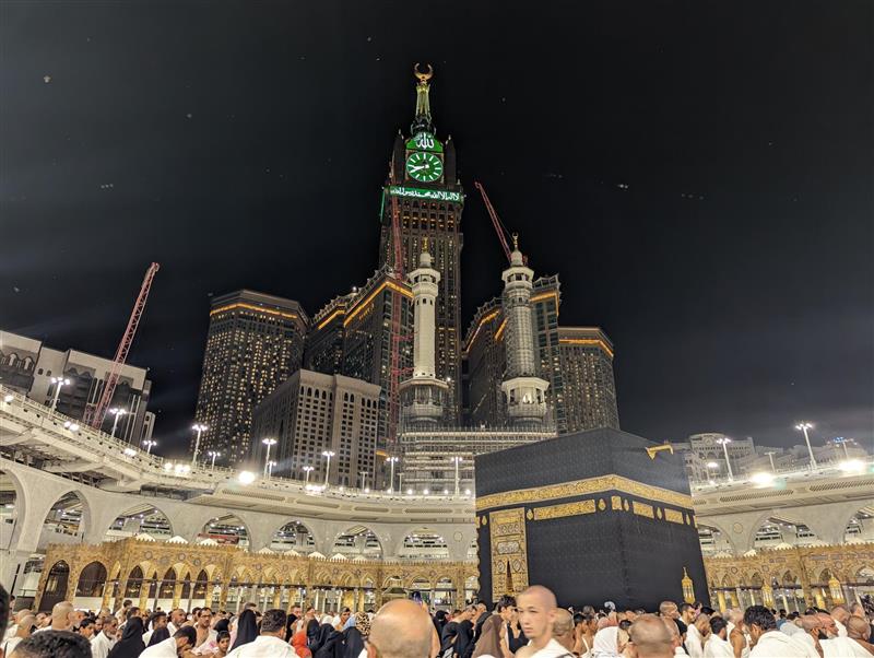 The Holy Kaaba at the Grand Mosque in Mecca and the Makkah Royal Clock Tower
