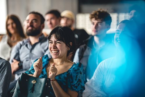 Group of students smiling, looking excited