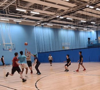 Students playing basketball 2