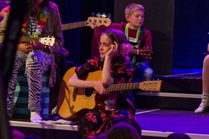 Isabella performing at her school in Denmark